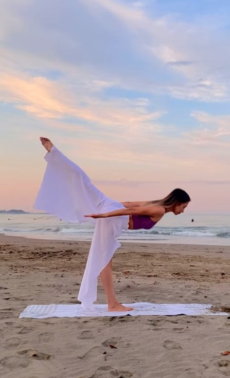 women doing yoga on beach-sunset yin yoga-mikkoa yoga